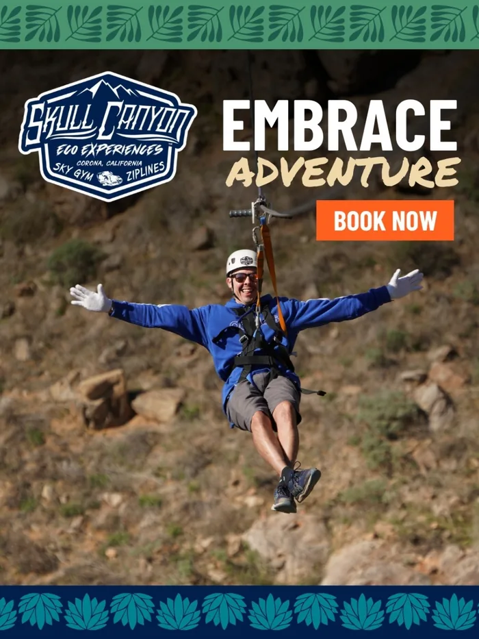 An Embrace Adventure ad showing a zipline rider with arms outstretched