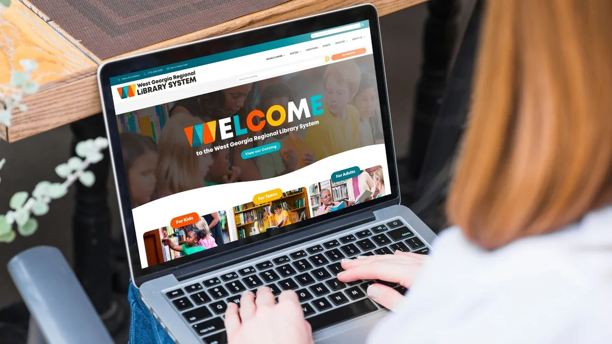 The West Georgia Regional Library System homepage open on a laptop